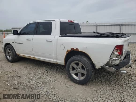 2011 Ram 1500 SLT with VIN 1D7RV1CT1BS664602, listed as a Copart auction lot 58494835 with 210,187 mi miles and Non repairable. Bid and sale history available at DreamBid. Image 2.