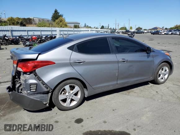 2012 Hyundai Elantra GLS with VIN KMHDH4AE7CU454640, listed as a Copart auction lot 82335265 with 86,367 mi miles and Salvage title. Bid and sale history available at DreamBid. Image 3.