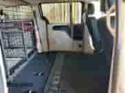 2018 Dodge Grand Caravan SE with VIN 2C4RDGBG0JR318559, listed as a Copart auction lot 67965755 with 312,674 mi miles and Clean title. Bid and sale history available at DreamBid. Image 11.