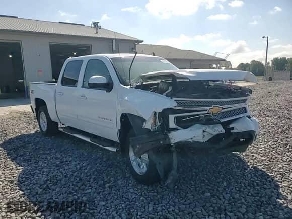 2012 Chevrolet Silverado 1500 LTZ with VIN 1GCPKTE71CF122304, listed as a Copart auction lot 85088215 with 217,510 mi miles and Salvage title. Bid and sale history available at DreamBid. Image 13.