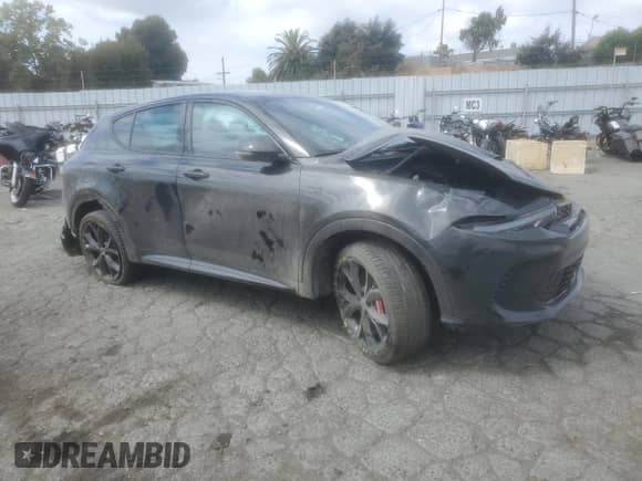 2024 Dodge Hornet R/T with VIN ZACPDFCW9R3A20686, listed as a Copart auction lot 71959264 with 5,017 mi miles and Salvage title. Bid and sale history available at DreamBid. Image 4.