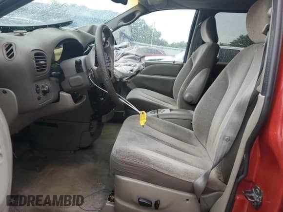 2002 Dodge Caravan ES z VIN 2B4GP54LX2R592721, wystawiony jako Copart lot #62667225 z przebiegiem Nie podano mil oraz Szkoda całkowita • Salvage title. Historia ofert i sprzedaży dostępna na DreamBid. Obrazek 7.