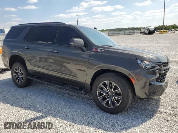 2021 Chevrolet Tahoe Z71 with VIN 1GNSKPKD3MR106219, listed as a Copart auction lot 81402095 with 91,205 mi miles and Salvage title. Bid and sale history available at DreamBid. Image 4.