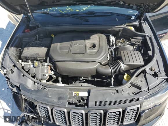 2021 Jeep Grand Cherokee Trailhawk с VIN 1C4RJFLG8MC588248, выставлен на аукционе Copart как лот 81893314 с пробегом 73 718 миль миль и На запчасти • Non repairable. История ставок и продаж доступна на DreamBid. Изображение 13.