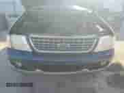 2004 Ford Explorer Eddie Bauer with VIN 1FMZU74W44UB78040, listed as a Copart auction lot 84029215 with 197,729 mi miles and Salvage title. Bid and sale history available at DreamBid. Image 12.