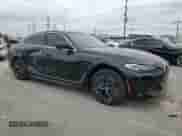 2024 BMW i4 eDrive35 with VIN WBY43AW05RFS57427, listed as a Copart auction lot 65464855 with 7,096 mi miles and Salvage title. Bid and sale history available at DreamBid. Image 4.