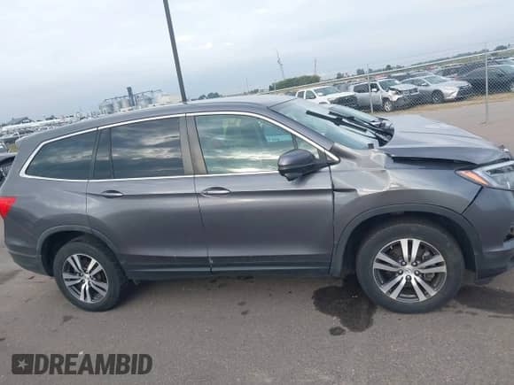 2018 Honda Pilot EX with VIN 5FNYF6H33JB044757, listed as a IAAI auction lot 43262855 with 106,702 mi miles and . Bid and sale history available at DreamBid. Image 13.