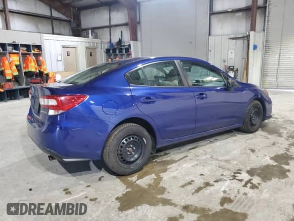 2022 Subaru Impreza with VIN 4S3GKAB61N3600211, listed as a Copart auction lot 69733165 with 100,496 mi miles and Salvage title. Bid and sale history available at DreamBid. Image 3.