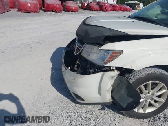 2017 Dodge Journey SXT z VIN 3C4PDCBG8HT589795, wystawiony jako IAAI lot #43359975 z przebiegiem 129 361 mil mil oraz . Historia ofert i sprzedaży dostępna na DreamBid. Obrazek 6.