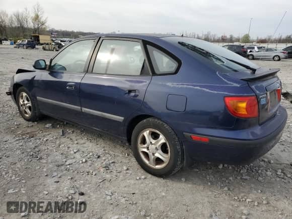 2003 Hyundai Elantra GT z VIN KMHDN55D03U078377, wystawiony jako Copart lot #51100395 z przebiegiem 192 766 mil mil oraz Szkoda całkowita • Salvage title. Historia ofert i sprzedaży dostępna na DreamBid. Obrazek 2.