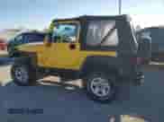 2000 Jeep Wrangler SE with VIN 1J4FA29P3YP705536, listed as a Copart auction lot 70344835 with 97,028 mi miles and Clean title. Bid and sale history available at DreamBid. Image 2.