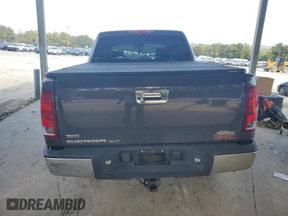 2011 GMC Sierra 1500 SLT z VIN 3GTP2WE35BG166947, wystawiony jako Copart lot #80467495 z przebiegiem 167 100 mil mil oraz Szkoda całkowita • Salvage title. Historia ofert i sprzedaży dostępna na DreamBid. Obrazek 6.