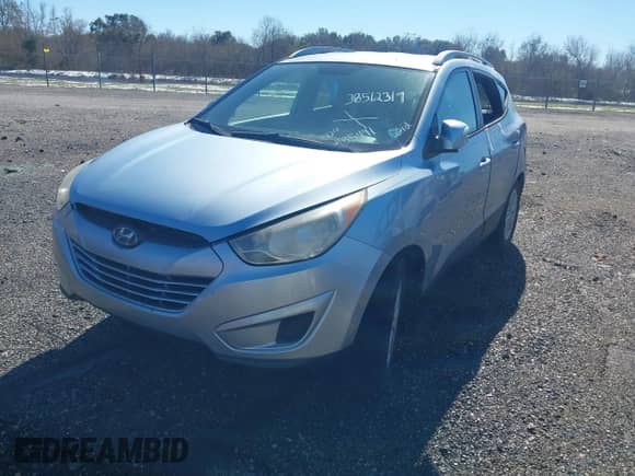 2012 Hyundai Tucson GLS with VIN KM8JU3AC3CU469367, listed as a IAAI auction lot 38512319 with 185,441 mi miles and . Bid and sale history available at DreamBid. Image 2.