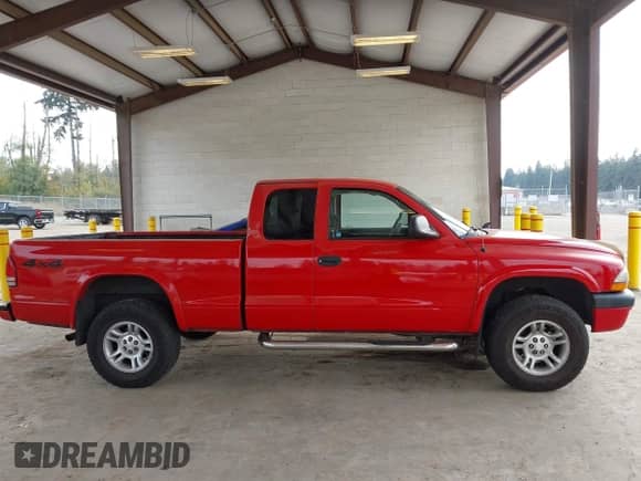 2003 Dodge Dakota with VIN 1D7HG32X93S146809, listed as a IAAI auction lot 43208367 with 215,080 mi miles and . Bid and sale history available at DreamBid. Image 14.