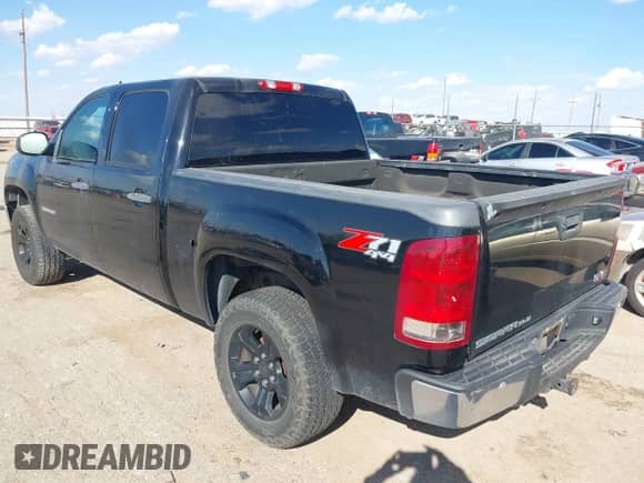 2013 GMC Sierra 1500 SLE z VIN 3GTP2VE7XDG185672, wystawiony jako IAAI lot #43336180 z przebiegiem 236 690 mil mil oraz . Historia ofert i sprzedaży dostępna na DreamBid. Obrazek 3.