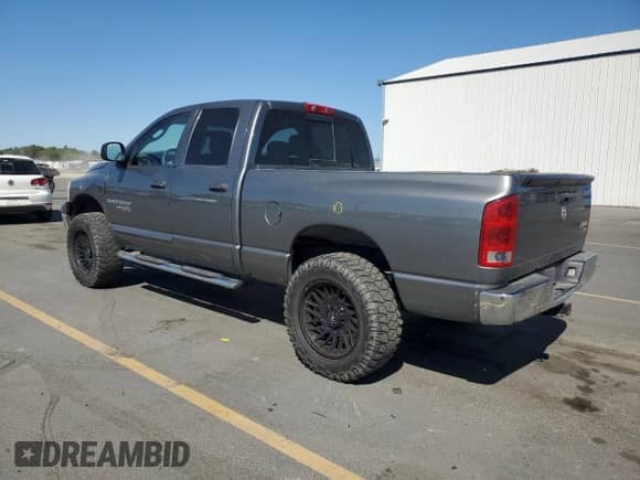 2006 Dodge 1500 SLT with VIN 1D7HU18N66S697514, listed as a Copart auction lot 82067275 with 193,347 mi miles and Salvage title. Bid and sale history available at DreamBid. Image 2.