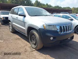 2012 Jeep Grand Cherokee Laredo z VIN 1C4RJEAG9CC151340, wystawiony jako IAAI lot #43249143 z przebiegiem 208 847 mil mil oraz . Historia ofert i sprzedaży dostępna na DreamBid. Obrazek 1.