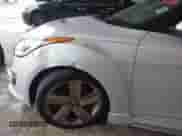 2013 Hyundai Veloster Turbo с VIN KMHTC6AE6DU079671, выставлен на аукционе IAAI как лот 43577765 с пробегом 139 477 миль миль и . История ставок и продаж доступна на DreamBid. Изображение 6.
