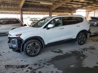 2020 Hyundai Santa Fe Limited с VIN 5NMS5CAA2LH218559, выставлен на аукционе Copart как лот 69940355 с пробегом 56 233 миль миль и Списание • Salvage title. История ставок и продаж доступна на DreamBid. Изображение 1.