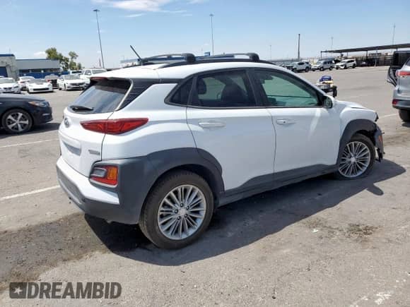 2020 Hyundai Kona SEL с VIN KM8K2CAA1LU566267, выставлен на аукционе Copart как лот 69216755 с пробегом 71 013 миль миль и Списание • Salvage title. История ставок и продаж доступна на DreamBid. Изображение 3.