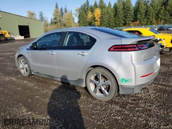 2015 Chevrolet Volt with VIN 1G1RD6E49FU135451, listed as a Copart auction lot 90511405 with 74,405 mi miles and Clean title. Bid and sale history available at DreamBid. Image 2.
