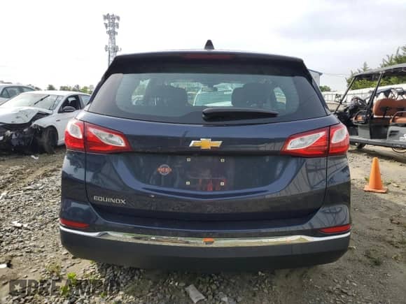 2018 Chevrolet Equinox LS with VIN 3GNAXHEV5JS562075, listed as a Copart auction lot 58121995 with 67,202 mi miles and Salvage title. Bid and sale history available at DreamBid. Image 6.