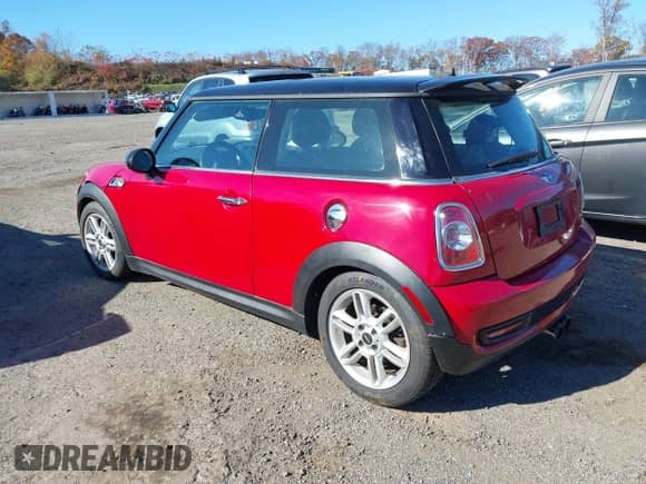 2013 MINI Hardtop S with VIN WMWSV3C56DT394690, listed as a IAAI auction lot 43551471 with 55,958 mi miles and . Bid and sale history available at DreamBid. Image 3.