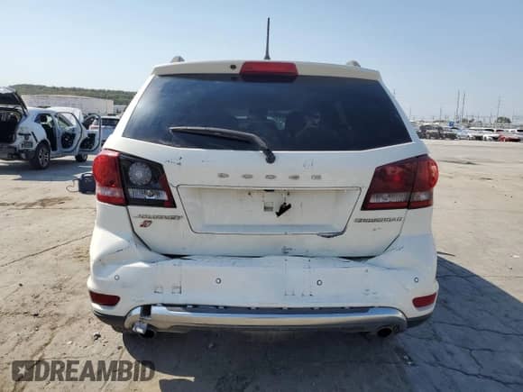 2018 Dodge Journey Crossroad with VIN 3C4PDDGGXJT504217, listed as a Copart auction lot 75477844 with 121,011 mi miles and Salvage title. Bid and sale history available at DreamBid. Image 6.