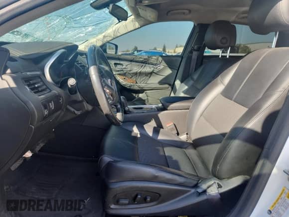 2014 Chevrolet Impala LT with VIN 2G1125S37E9191182, listed as a Copart auction lot 87458795 with 144,049 mi miles and Salvage title. Bid and sale history available at DreamBid. Image 7.