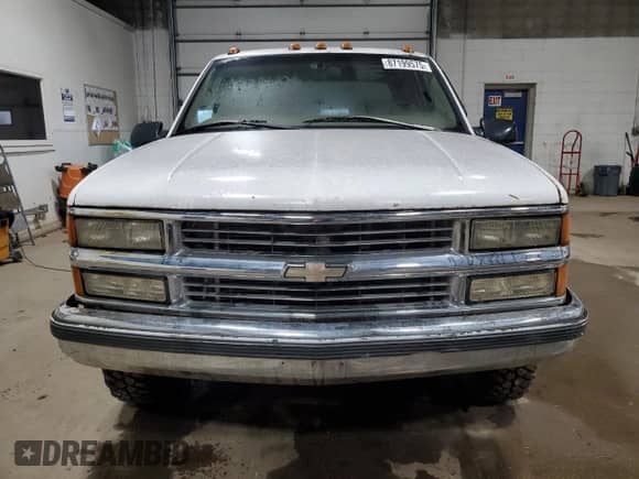 1997 Chevrolet Silverado 3500 с VIN 1GCHC33J5VF002668, выставлен на аукционе Copart как лот 87199575 с пробегом 156 834 миль миль и Чистый • Clean title. История ставок и продаж доступна на DreamBid. Изображение 5.
