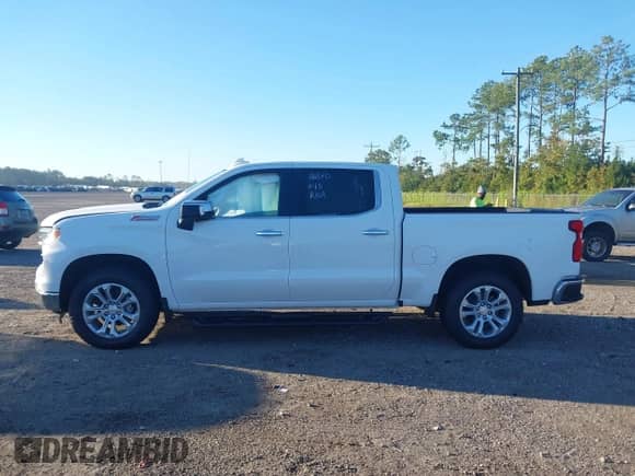 2025 Chevrolet Silverado 1500 LTZ with VIN 1GCUKGEDXSZ297180, listed as a IAAI auction lot 43445927 with 242 mi miles and . Bid and sale history available at DreamBid. Image 14.