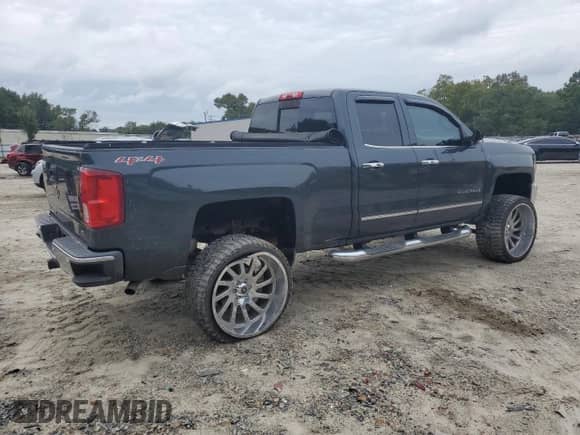 2017 Chevrolet Silverado 1500 LTZ с VIN 1GCVKSEC4HZ181058, выставлен на аукционе Copart как лот 80329495 с пробегом 103 071 миль миль и Списание • Salvage title. История ставок и продаж доступна на DreamBid. Изображение 3.