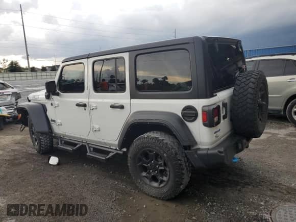 2023 Jeep Wrangler with VIN 1C4JJXN60PW663065, listed as a Copart auction lot 61904565 with 34,831 mi miles and Non repairable. Bid and sale history available at DreamBid. Image 2.