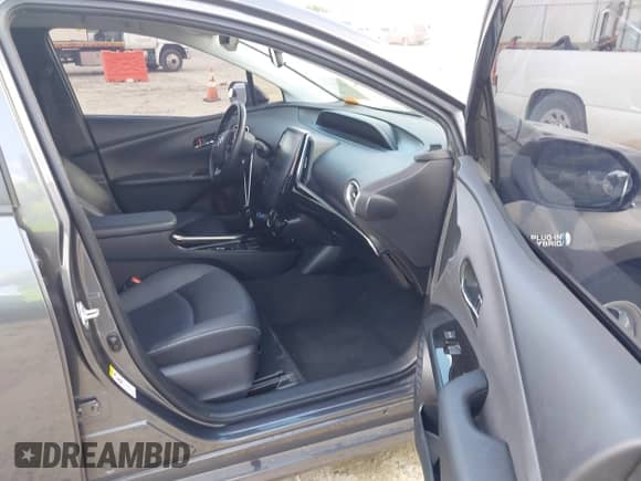 2022 Toyota Prius Limited with VIN JTDKAMFP6N3201845, listed as a IAAI auction lot 43216746 with 82,457 mi miles and . Bid and sale history available at DreamBid. Image 5.