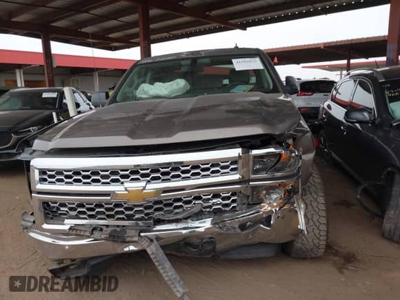 2014 Chevrolet Silverado 1500 LT with VIN 3GCUKREH6EG381743, listed as a IAAI auction lot 41583823 with 141,671 mi miles and . Bid and sale history available at DreamBid. Image 6.
