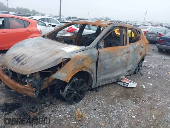 2015 Hyundai Santa Fe with VIN 5XYZUDLB2FG262539, listed as a IAAI auction lot 42690834 with 202,000 mi miles and . Bid and sale history available at DreamBid. Image 6.