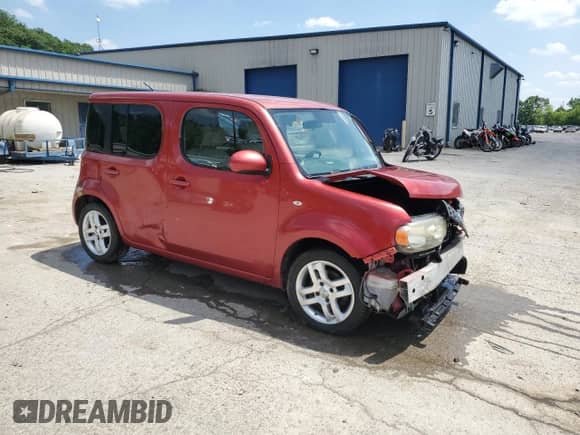 2010 Nissan Cube SL с VIN JN8AZ2KR6AT157456, выставлен на аукционе Copart как лот 61933965 с пробегом 159 994 миль миль и Списание • Salvage title. История ставок и продаж доступна на DreamBid. Изображение 4.