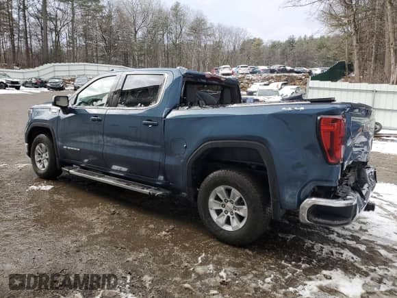 2024 GMC Sierra 1500 SLE with VIN 1GTPUBEK9RZ395555, listed as a Copart auction lot 83527454 with 3,264 mi miles and Salvage title. Bid and sale history available at DreamBid. Image 2.