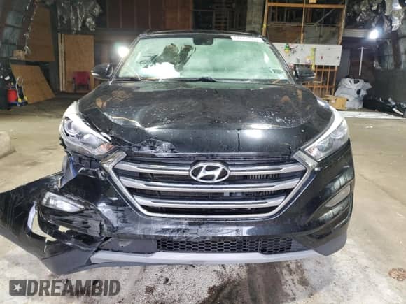 2018 Hyundai Tucson Limited with VIN KM8J3CA23JU813304, listed as a Copart auction lot 86651605 with 128,587 mi miles and Salvage title. Bid and sale history available at DreamBid. Image 5.