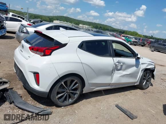 2019 Hyundai Veloster 2.0 z VIN KMHTG6AF8KU005288, wystawiony jako IAAI lot #42822776 z przebiegiem 112 374 mil mil oraz . Historia ofert i sprzedaży dostępna na DreamBid. Obrazek 12.