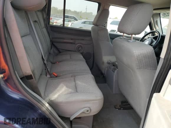 2006 Jeep Commander with VIN 1J8HG48N76C153626, listed as a Copart auction lot 70720825 with 140,685 mi miles and Salvage title. Bid and sale history available at DreamBid. Image 11.