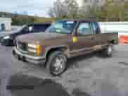 1994 GMC Sierra 1500 with VIN 2GTEK19K1R1548357, listed as a Copart auction lot 82556885 with 157,548 mi miles and Clean title. Bid and sale history available at DreamBid. Image 1.