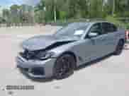 2023 BMW 5 Series 530e with VIN WBA13AG07PCN20158, listed as a IAAI auction lot 42146666 with 31,619 mi miles and . Bid and sale history available at DreamBid. Image 2.