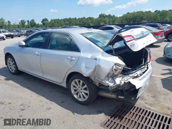 2012 Toyota Camry SE with VIN 4T1BK1FK5CU513674, listed as a IAAI auction lot 42996159 with 243,583 mi miles and . Bid and sale history available at DreamBid. Image 3.
