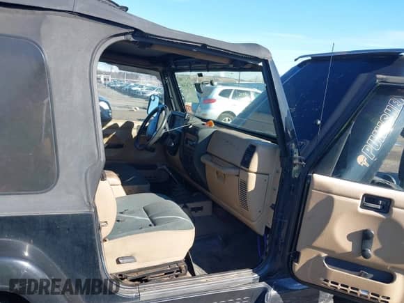 1999 Jeep Wrangler Sahara с VIN 1J4FY49S1XP451531, выставлен на аукционе IAAI как лот 41830315 с пробегом 244 154 миль миль и . История ставок и продаж доступна на DreamBid. Изображение 5.