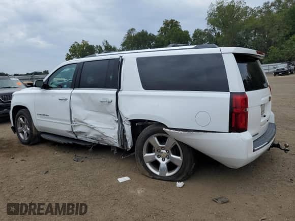 2017 Chevrolet Suburban Premier с VIN 1GNSKJKC5HR216909, выставлен на аукционе Copart как лот 81224145 с пробегом 147 585 миль миль и Списание • Salvage title. История ставок и продаж доступна на DreamBid. Изображение 2.
