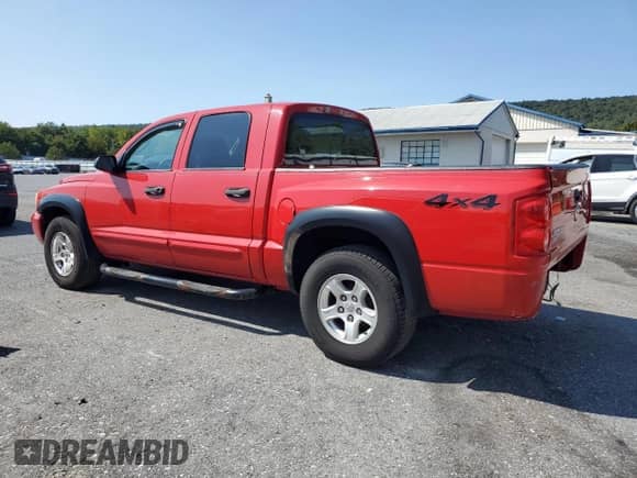 2006 Dodge Dakota SLT with VIN 1D7HW48N76S503312, listed as a Copart auction lot 80128295 with 179,802 mi miles and Salvage title. Bid and sale history available at DreamBid. Image 2.