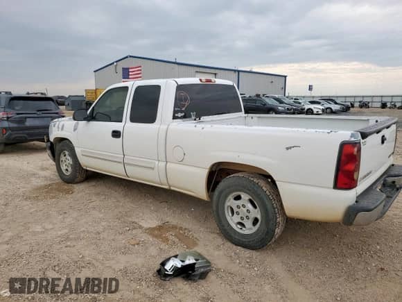 2004 Chevrolet Silverado 1500 Work Truck with VIN 2GCEC19V641173274, listed as a Copart auction lot 70104735 with 184,952 mi miles and Salvage title. Bid and sale history available at DreamBid. Image 2.