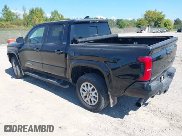 2024 Toyota Tacoma SR5 with VIN 3TMLB5JN4RM068147, listed as a IAAI auction lot 43177753 with 15,469 mi miles and . Bid and sale history available at DreamBid. Image 3.