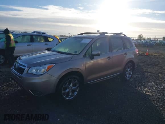 2016 Subaru Forester Touring with VIN JF2SJAXC9GH556784, listed as a IAAI auction lot 43378533 with 72,771 mi miles and . Bid and sale history available at DreamBid. Image 17.